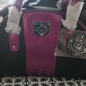 Sourpuss Jinx Tuck & Roll Purse in Purple